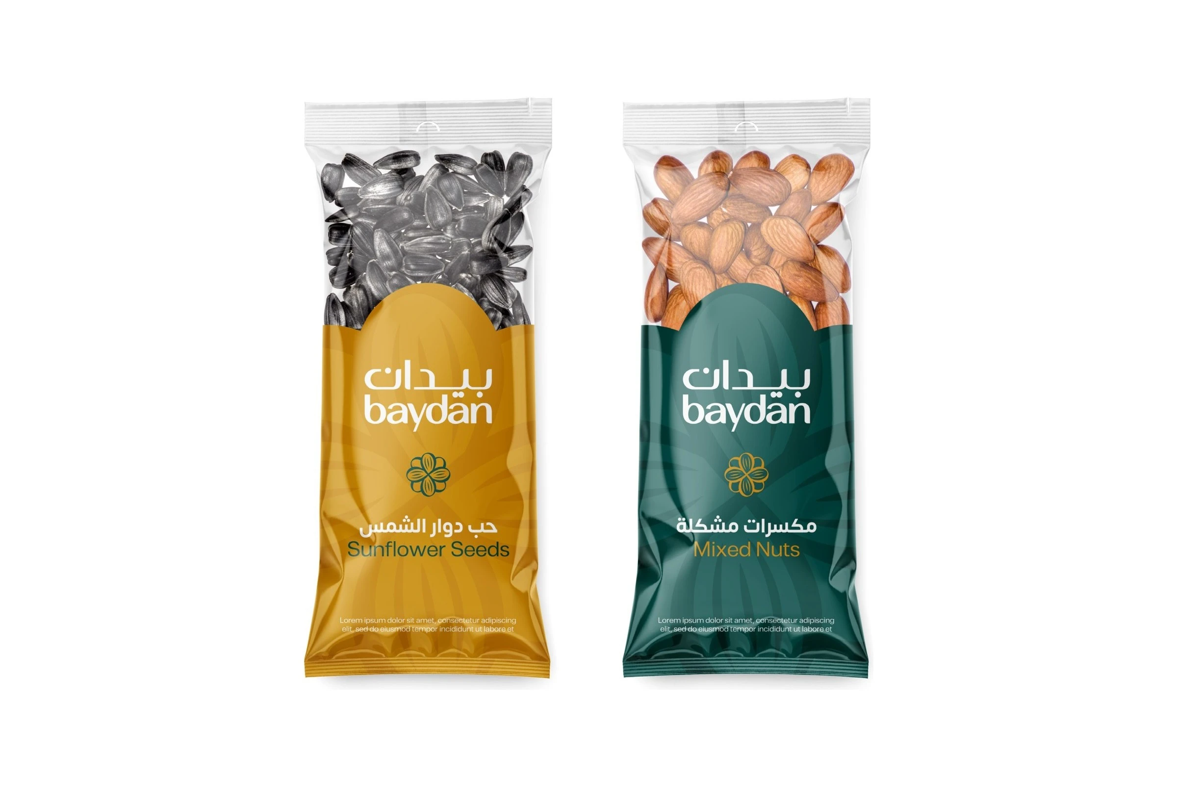 Two clear packs with arched labels, a gold one for sunflower seeds and a green one for mixed nuts, each with the logo and the almond flower.