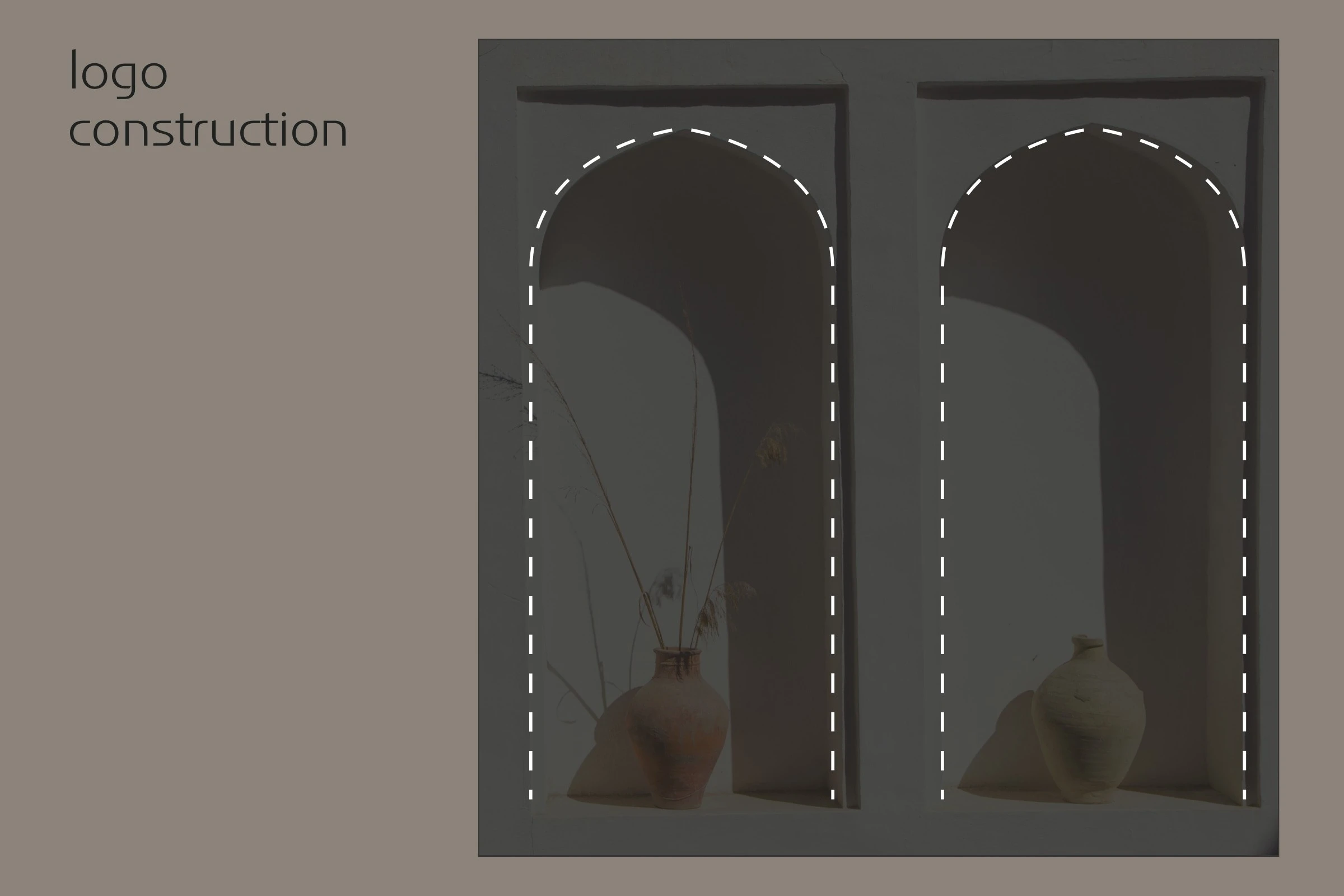 Logo construction: dashed arches traced over two wall niches.